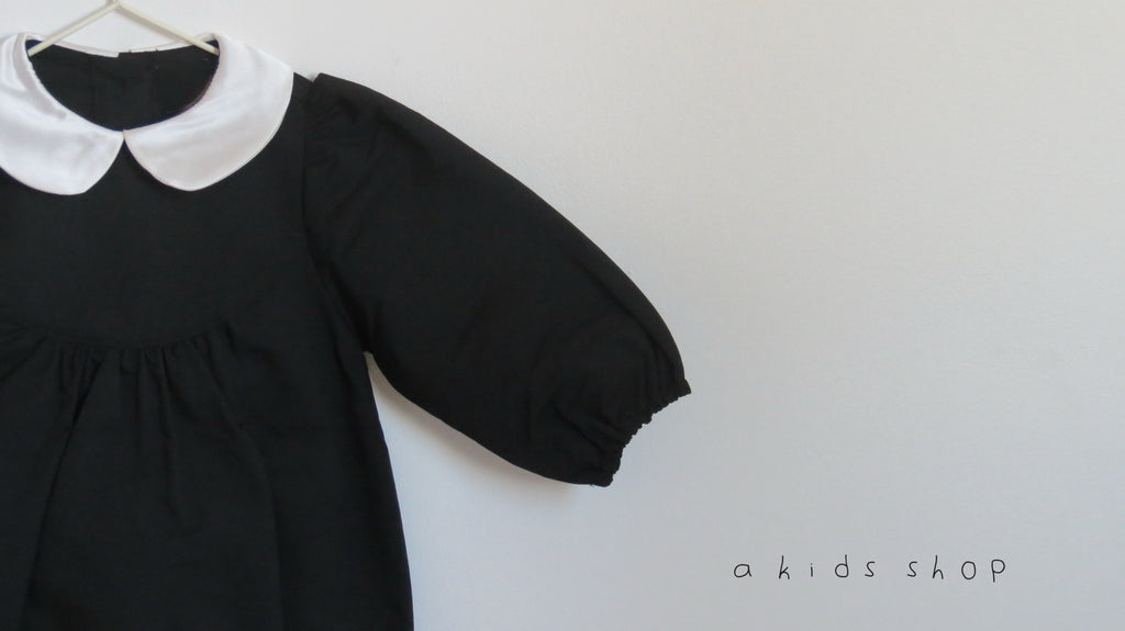 the classic black romper