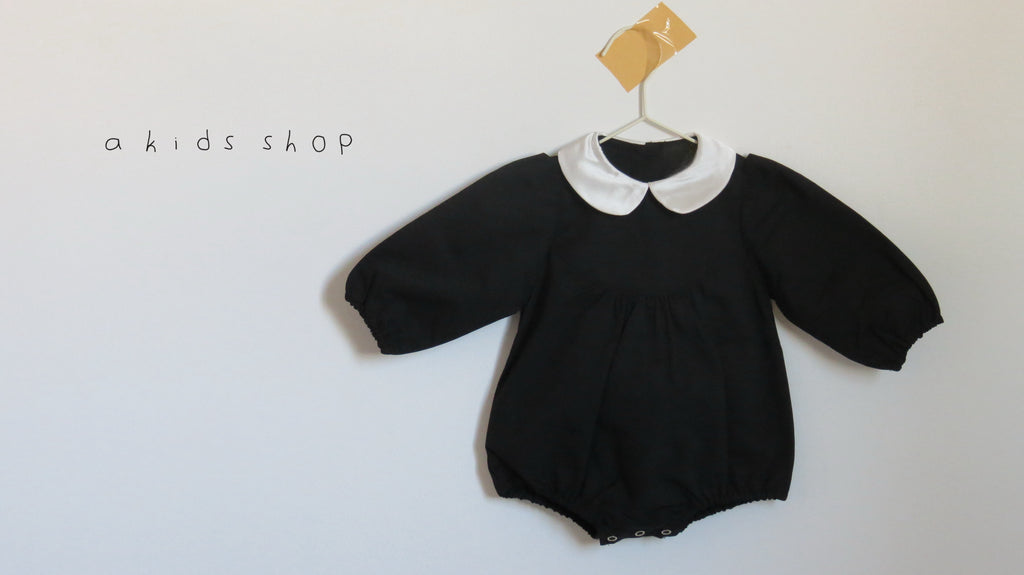 the classic black romper