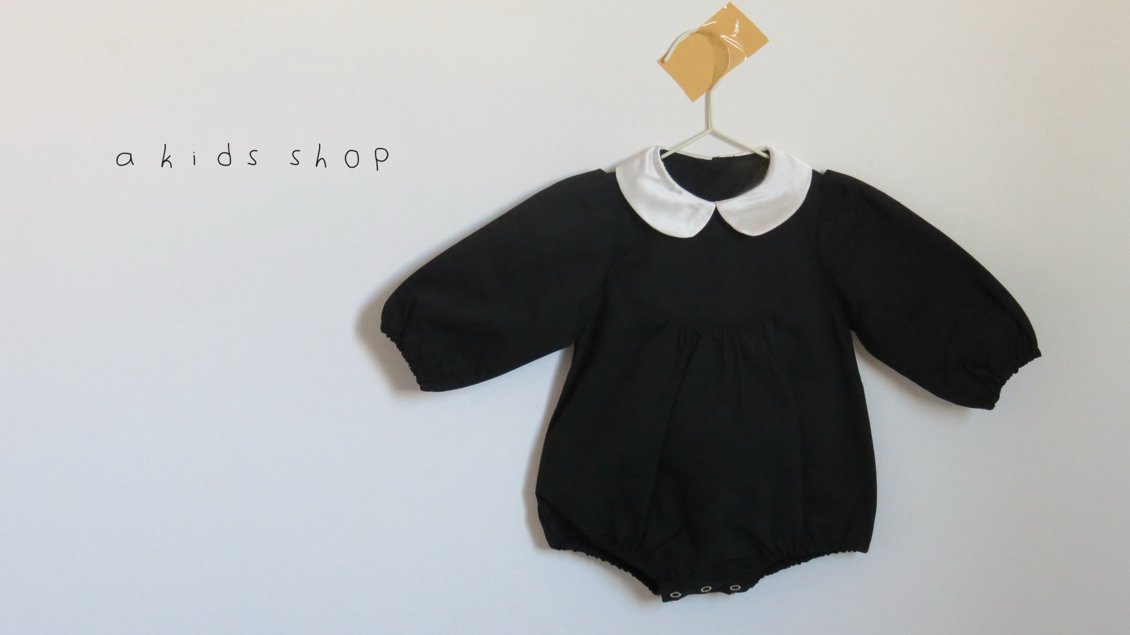 the classic black romper